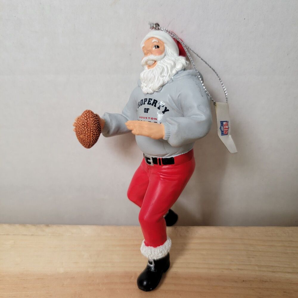 NFL Houston Texans Santa Playing Football Ornament 5"